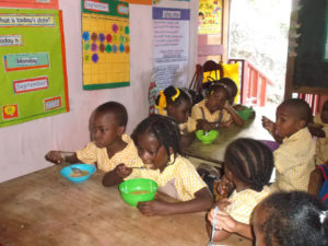 children-eating-jeffrey-town-jamaica-2a